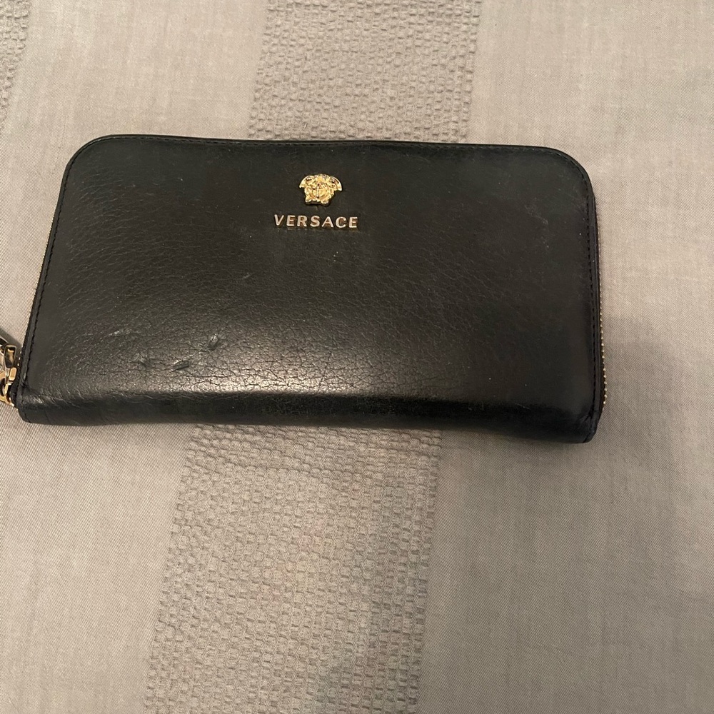 Versace wallet full zip outside slightly dented